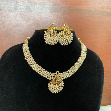 Peacock pearl set